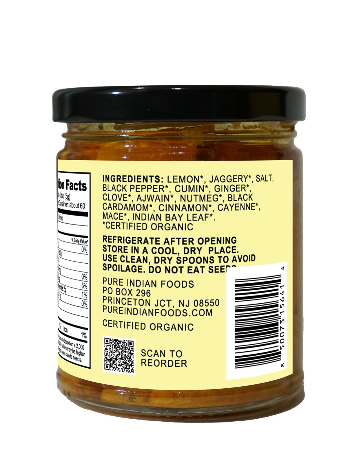 Ingredients label on a jar of Organic Fermented Sweet Lemon Pickle by Pure Indian Foods: Lemon, Jarggery, Salt, Black Pepper, Cumin, Ginger, Clove, Ajwain, Nutmeg, Black Cardamom, Cinnamon, Cayenne, Mace, Indian Bay Leaf.