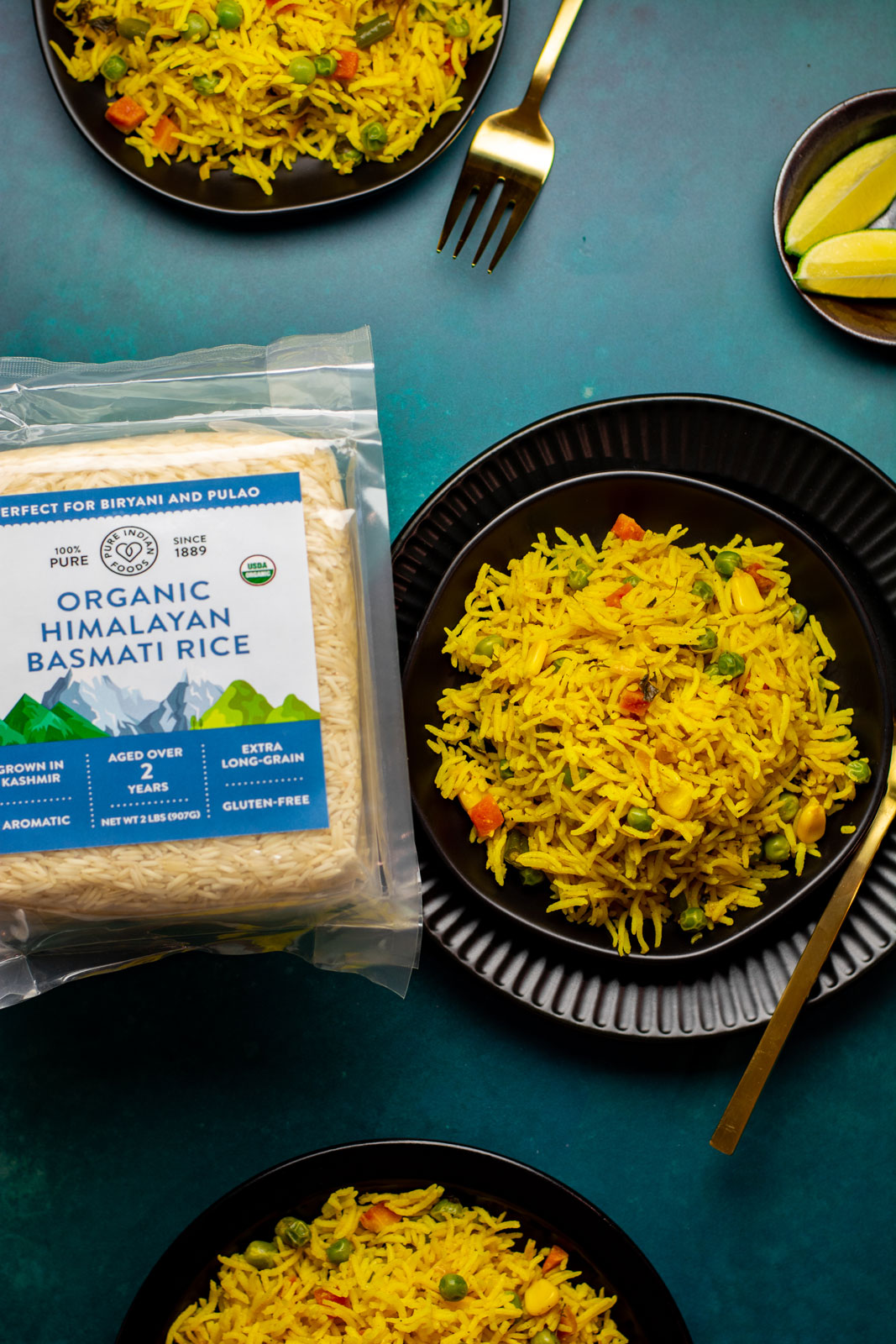 Bowls of pulao made with our Pure Indian Foods aged basmati rice. Gorgeous, aromatic, and so satisfying!