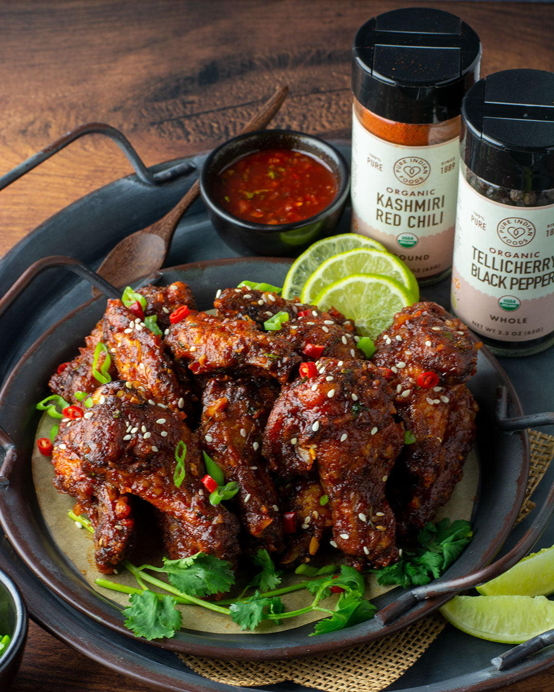 Korean Gochujang Chicken Wings made with Pure Indian Foods Organic Kashmiri Chili Powder and Tellicherry Black Peppercorns.