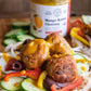 Gorgeous falafel and veg on pita with our tasty organic mango chutney in the background.