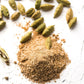 Beautifully scattered organic green cardamom pods and powder from Pure Indian Foods.