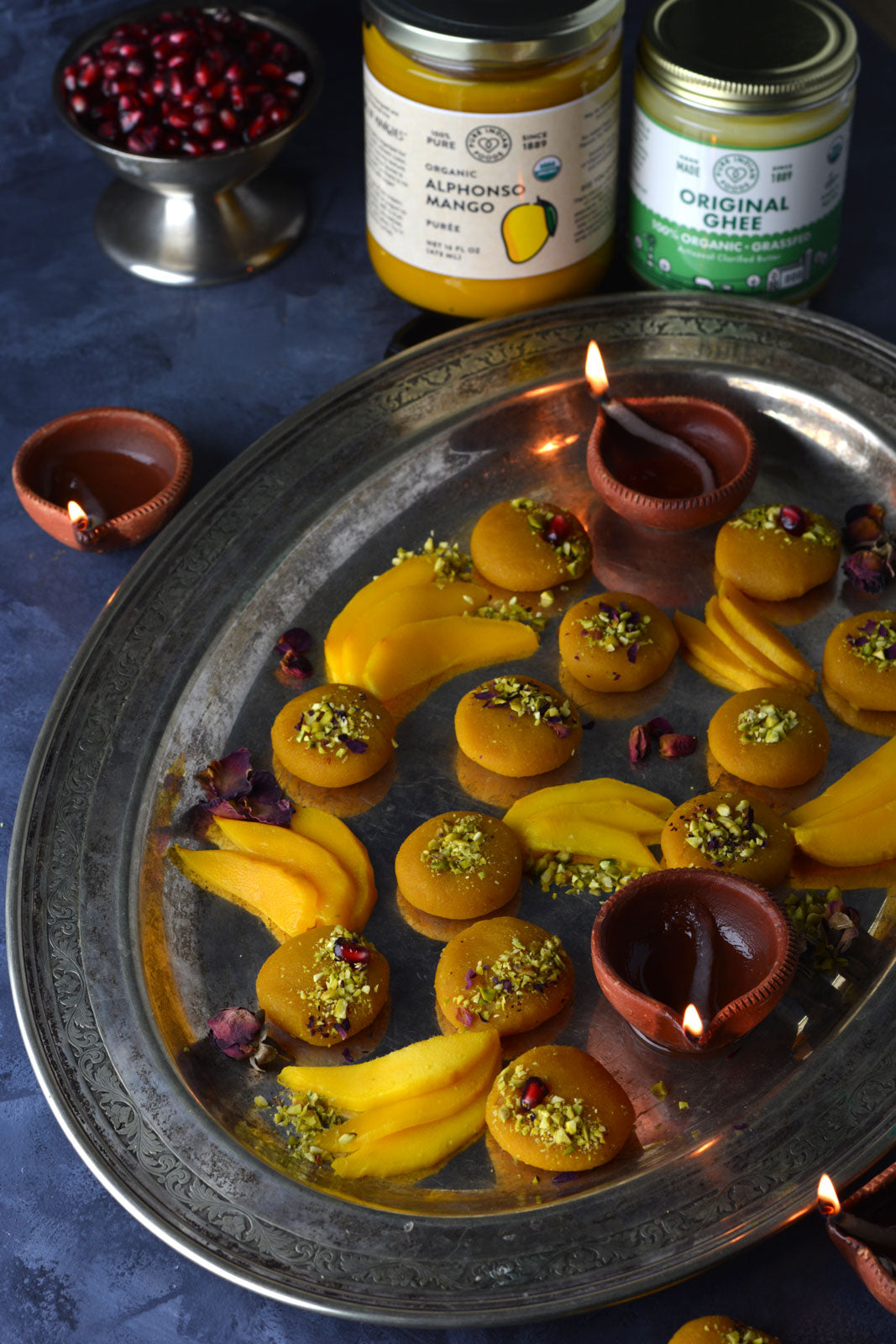 tray of almond mango pedas, a type of indian mango fudge, made with alphonso mango puree containing 100% pure organic mango pulp and organic grassfed ghee