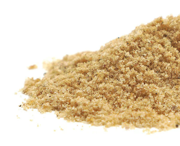 freshly grated powdered asafoetida on a white background