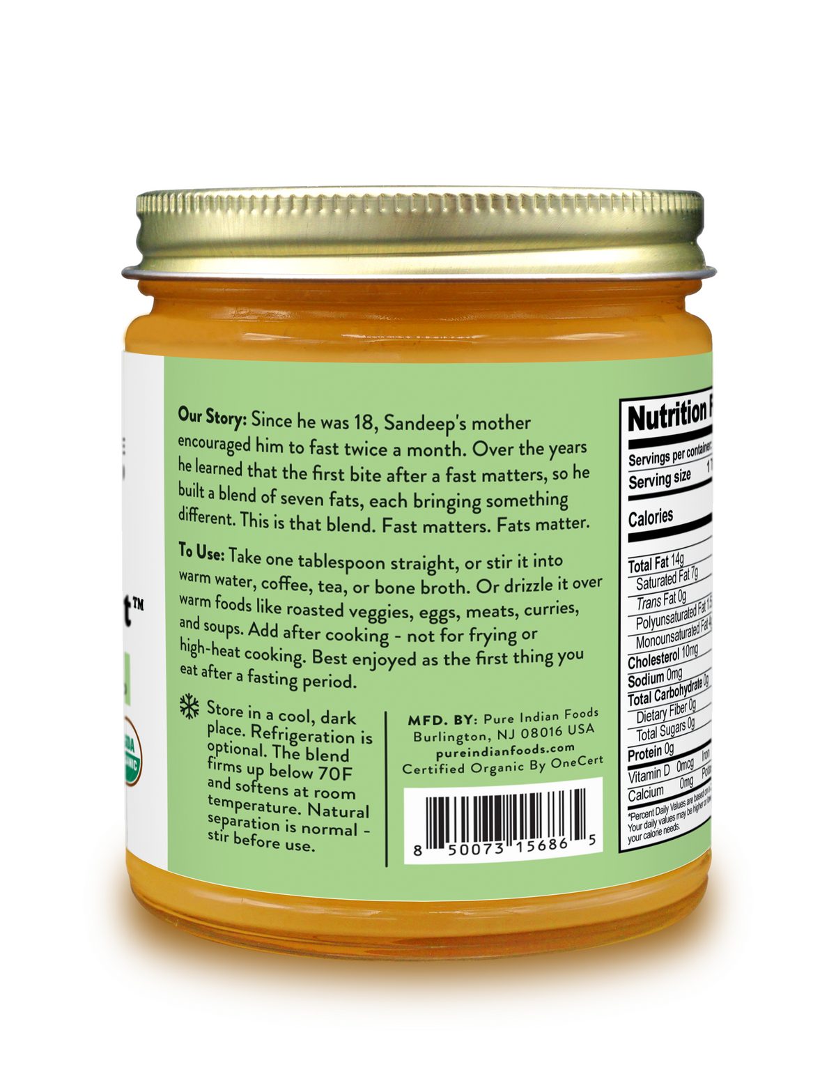 Back view of a jar of Pure Indian Foods Sandeep's Break-the-Fast Seven Oil Blend, showing the green and white label with product details, ingredients, and nutrition facts, topped with a gold metal lid.