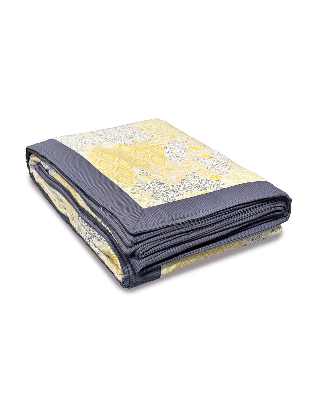 Folded handmade blanket with yellow and gray pattern made with upcycled cotton on a white background