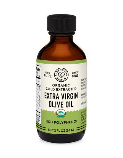 a bottle of organic extra virgin olive oil cold Pressed and high polyphenol from pure Indian foods
