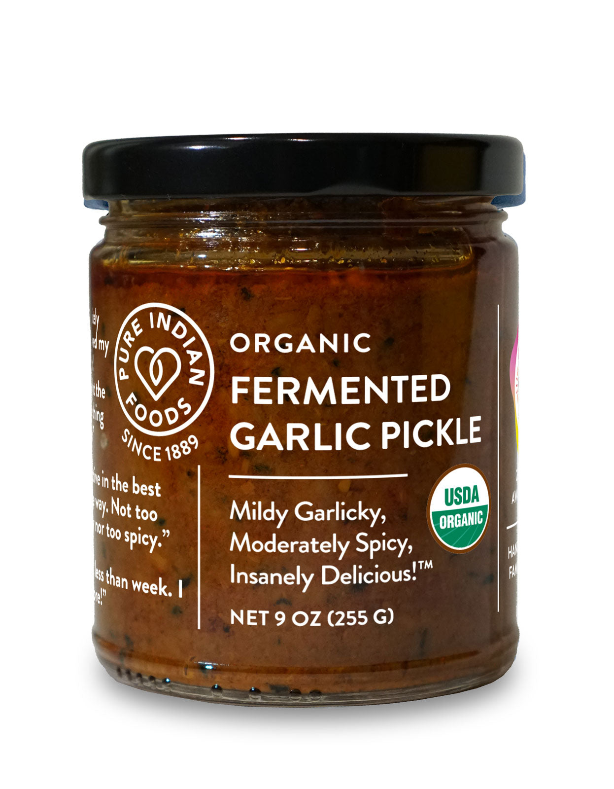 Front view of a jar of Organic Fermented Garlic Pickle from Pure Indian Foods: a mildly garlicky, moderately spice, insanely delicious achaar