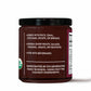 Back view of a jar of Organic Kokum Chutney with a black lid, showing product text, a USDA Organic seal, and a partial side nutrition label on a white background.