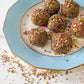 A plate of freshly rolled laddu made from our Organic Ladoo in a Jar mix.