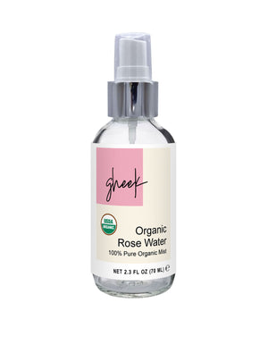 Bottle of Gheek organic rose water mist with a pink label on a white background