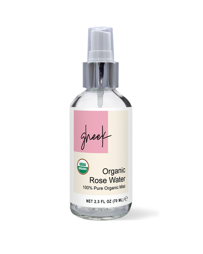 A spray bottle of Gheek Organic Rose Water on a white background