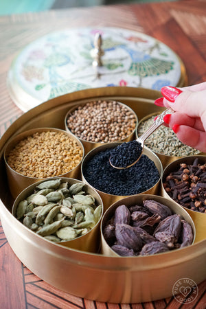 Sacred Peacock Indian Spice Box, aka a masala Dabba, filled with all organic spices from Pure Indian Foods.