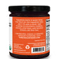 Side label on a jar of organic tamarind concentrate from Pure Indian Foods saying that tamarind paste is made from the fruit of the Tamarind tree and can be used to add a sour, tart flavor to chutneys, curries, sauces, stir fries, and noodle dishes like pad Thai.