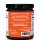 Side label on a jar of organic tamarind concentrate from Pure Indian Foods saying that tamarind paste is made from the fruit of the Tamarind tree and can be used to add a sour, tart flavor to chutneys, curries, sauces, stir fries, and noodle dishes like pad Thai.