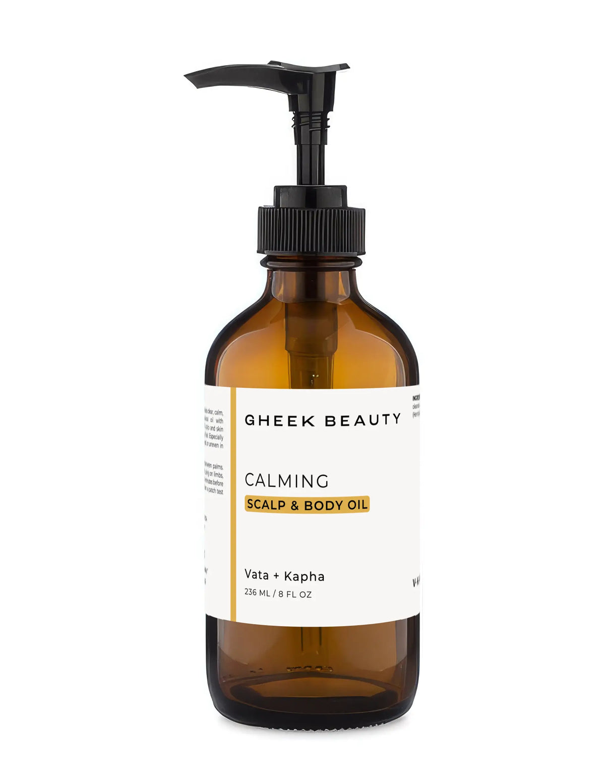 Gheek Beauty Calming Scalp & Body Oil in an amber glass pump bottle with a black pump and a white label featuring gold accents, set against a plain white background.