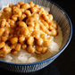 A bowl of rehydrated non-gmo natto beans served on rice.