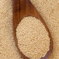 A wooden spoonful of organic amaranth grain from Pure Indian Foods