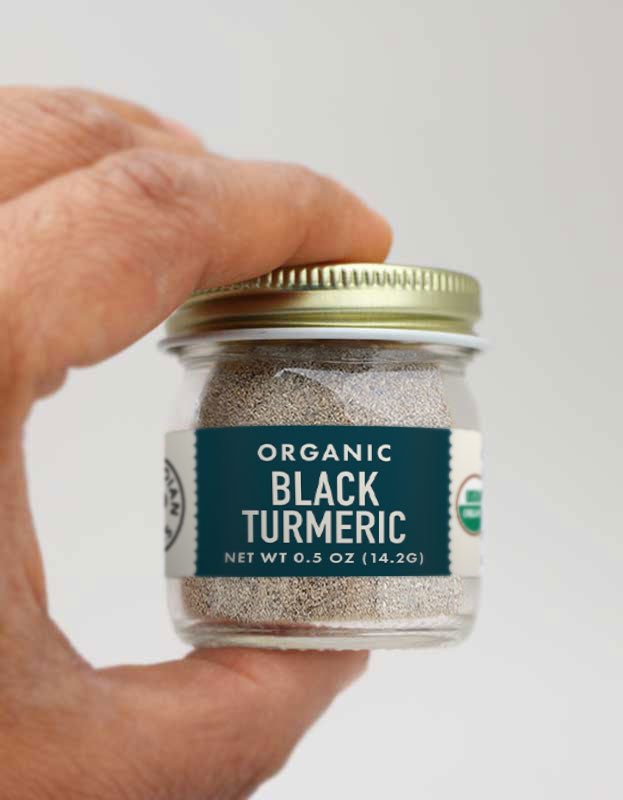 Close up of a small jar of Pure Indian Foods Organic Black Turmeric Powder