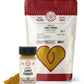 Organic Curry Powder Seasoning Blend from Pure Indian Foods. An 8oz bag and a 2.4oz glass jar of the curry seasoning are on display.