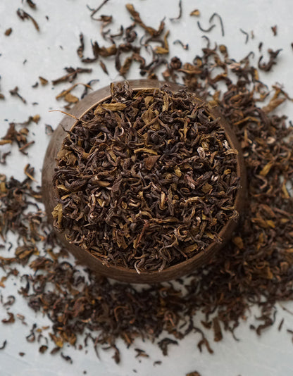 Birds eye view of a pile of loose leaf Darjeeling Black Tea from Pure Indian Foods.