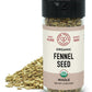 A jar of organic fennel seed from Pure Indian Foods is placed in front of a small pile of whole fennel seeds on a white background.