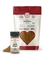 Pure Indian Foods Organic Garam Masala Powder in both an 8oz bag and a 2.4oz glass bottle.