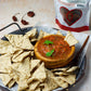 A serving platter of chips and salsa made with whole smoked ghost pepper from Pure Indian Foods