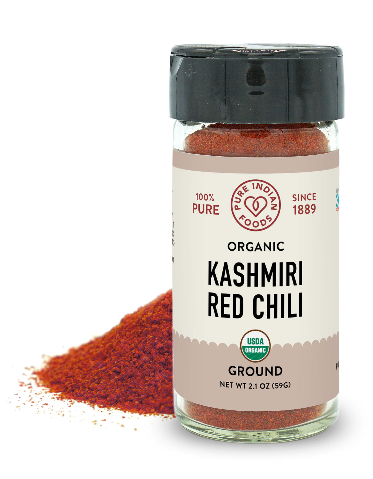 Jar of Pure Indian Foods Organic Kashmiri Red Chili Powder (deggi mirch). It's a beautiful bright red color. No food coloring, dyes, fillers, or additives. 100% Pure. Perfect for curries!