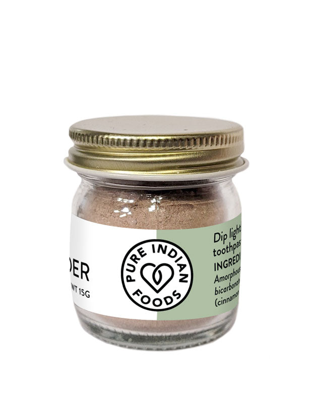 Small jar of Pure Indian Foods Neem Tooth Powder