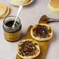 Organic chyawanprash, an ayurvedic herbal jam, spread on an English muffin. Delicious!