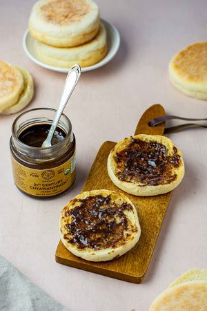 Organic chyavanprash, an ayurvedic herbal jam, spread on an English muffin. Delicious!