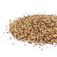 a pile of organic quinoa in a tri color mix on a white background
