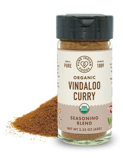Bottle of Pure Indian Foods Organic Vindaloo Curry seasoning blend on a white background