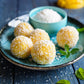 plate of mango coconut ladoos made with alphonso mango puree